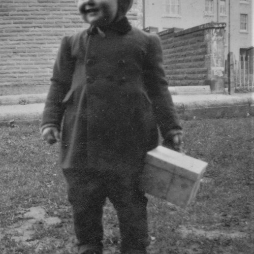 Murdo Morrison Outside The Close At 90 Glencoe Street, Anniesland With An Easter Egg In A Box, Early 1950S