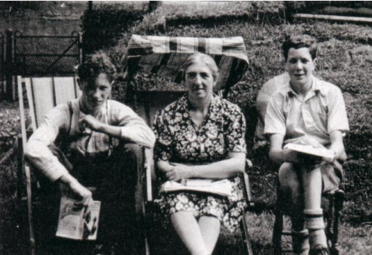 The late Dr Iain Blair MacDuff as a child, with stepmother Lizzie Bothwell and brother Tom at the Blair’s house, 8 Taylor Street Whitecrook. C.1940/41  after the Clydebank Blitz